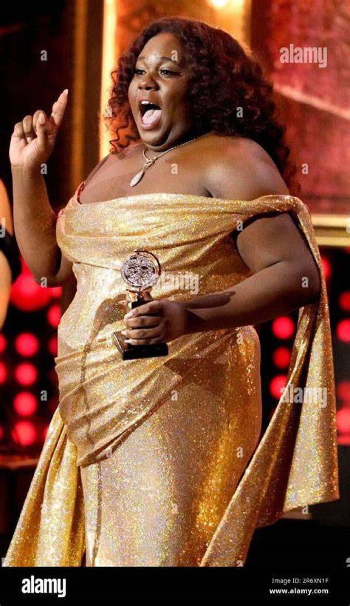 Alex Newell accepts the award for best performance by an actor in a featured role in a musical for "Shucked". Photo / AP