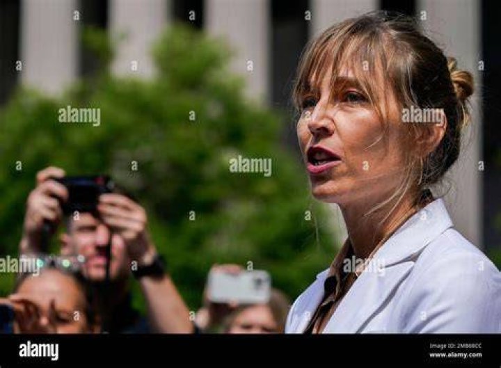 Annie Farmer, who testified against Ghislaine Maxwell at trial, speaks to members of the media outside federal court in New York today. Photo / AP