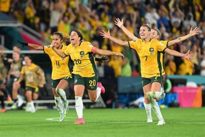Australia celebrate during their shootout victory over France. Photo / Getty Images