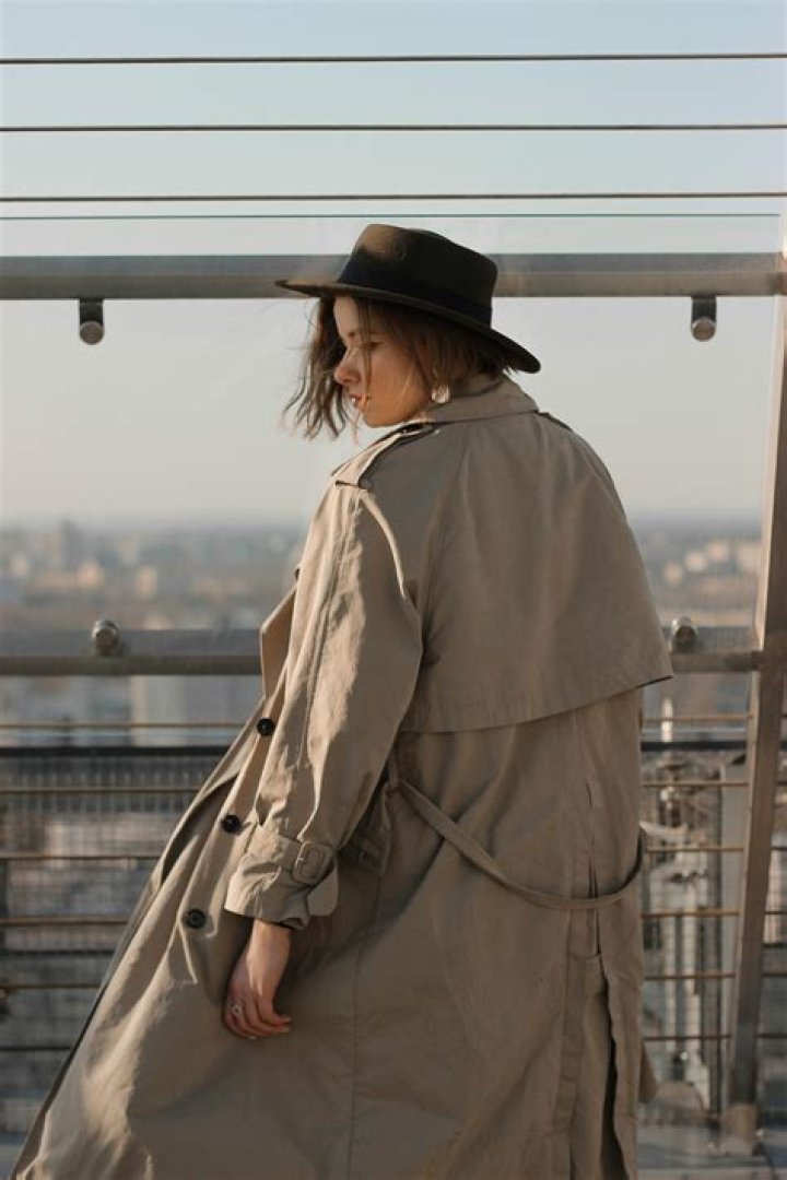 back of person wearing brown headphones