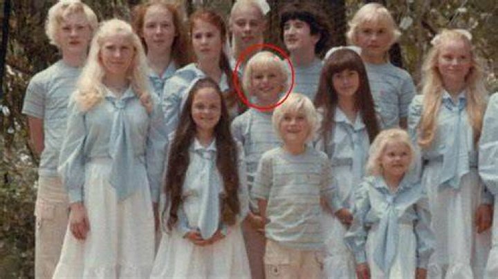 Ben Shenton (centre circled) among the 14 children in The Family cult dressed in matching outfits. Photo: 'The Family'.