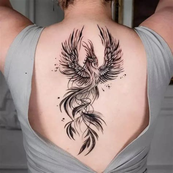 Black phoenix on the back Black phoenix on the back