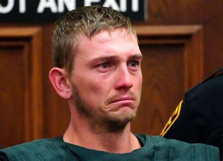 Chad Doerman sheds a tear as he stands just inside the Clermont County Municipal courtroom for his bond hearing. Photo / AP