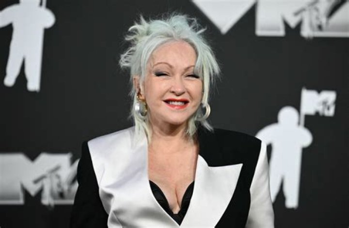 Cyndi Lauper as Composer in BLACK OR WHITE 