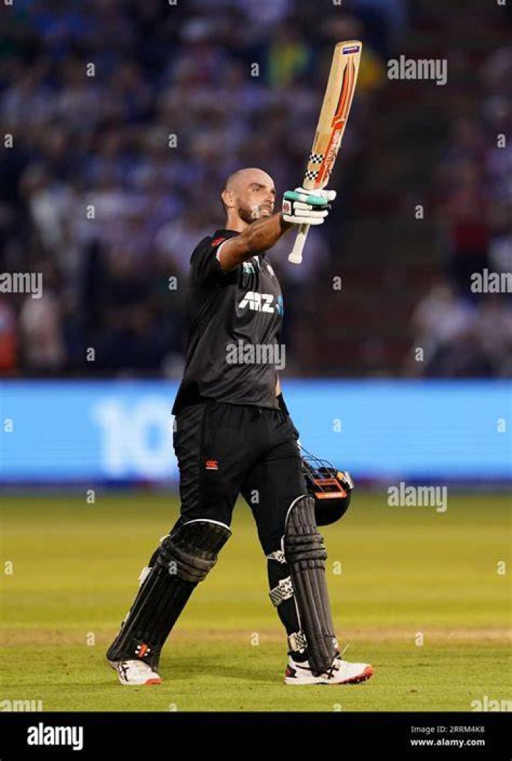 Daryl Mitchell celebrates his century against India. Photo / photosport.nz
