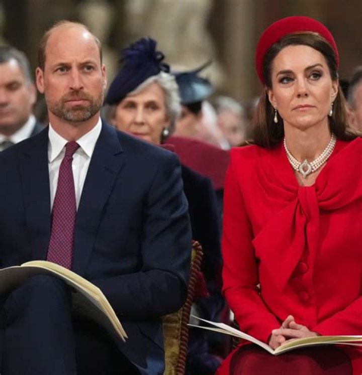 From left, Kate, the Princess of Wales, Prince William, Prince of Wales, Prince Harry and Meghan, Duchess of Sussex walk to meet members of the public at Windsor Castle. Photo / AP