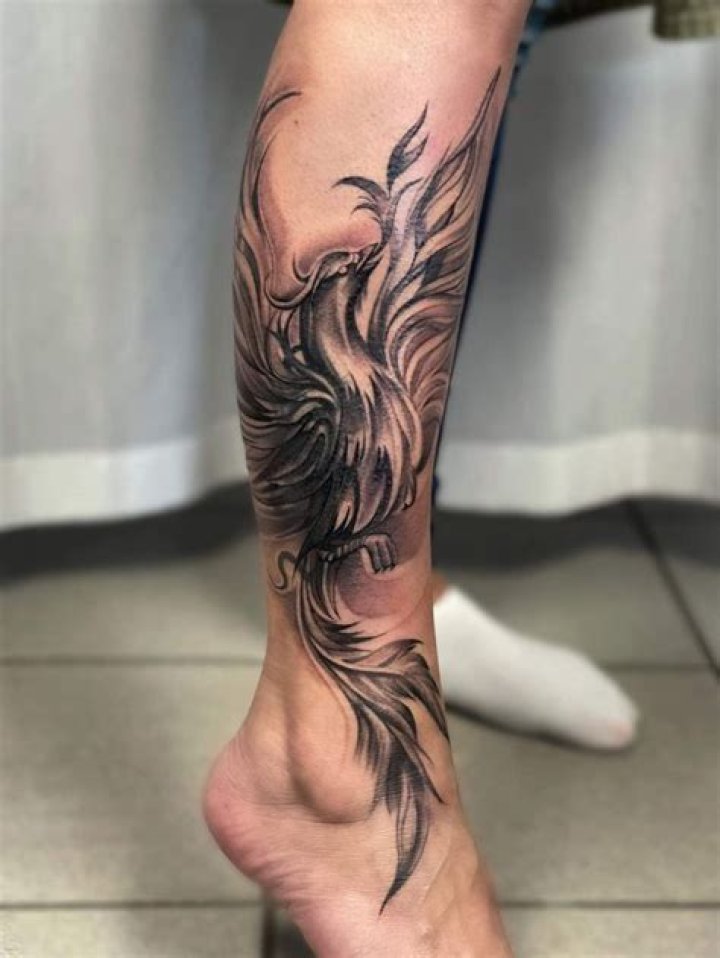 Leg phoenix tattoo Leg phoenix tattoo