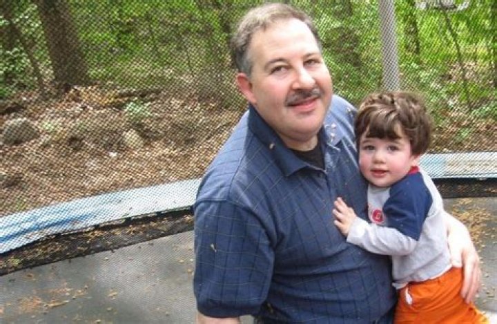 Lenny Pozner with his son Noah, who was killed in the shooting.