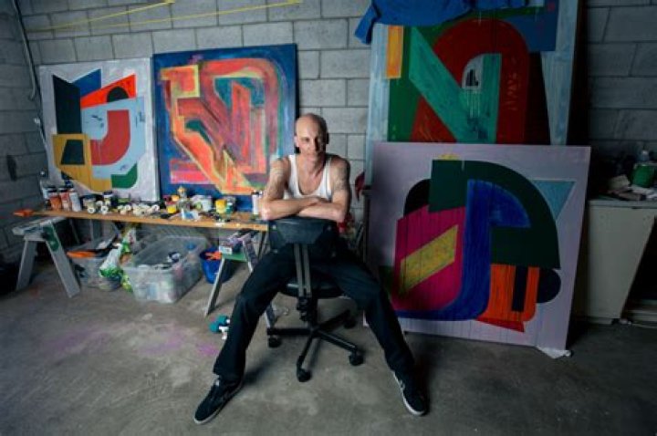 Levi Hawken in the studio where he makes cast concrete garden sculptures.