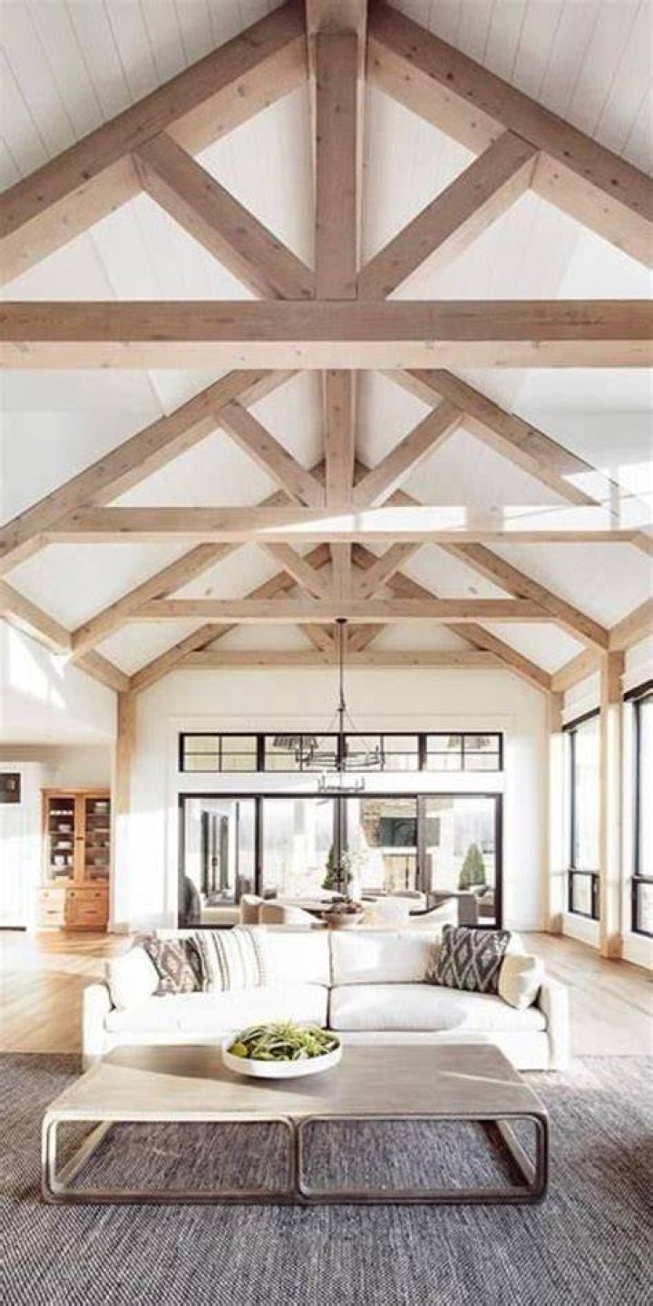 Living room with beamed ceiling