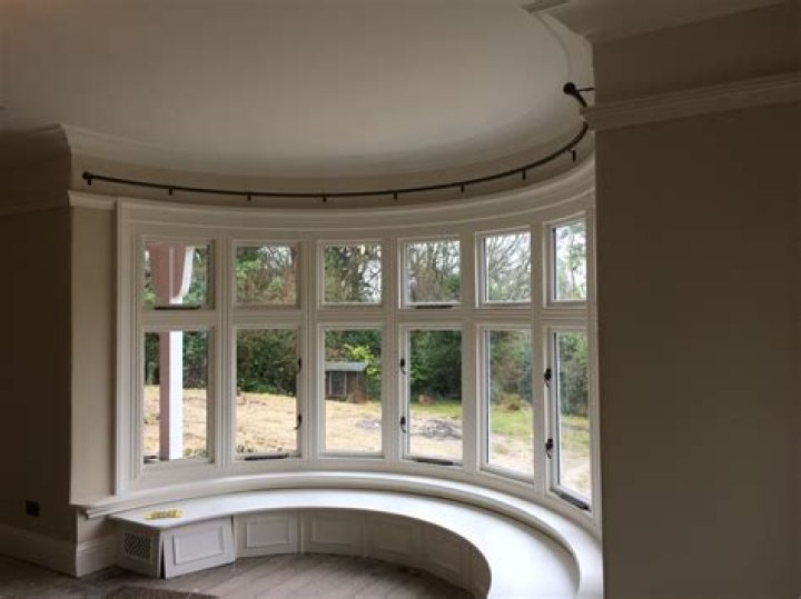 Living room with curved window