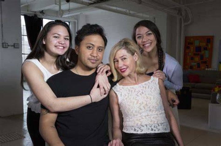 Mary Kay Letourneau holds the baby that was fathered by a boy she once taught as an elementary school teacher. Photo / AP