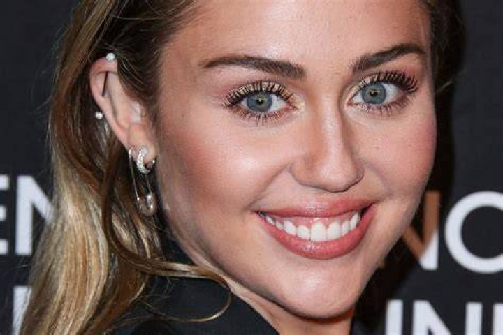 Miley Cyrus' arm tattoos Miley Cyrus' arm tattoos