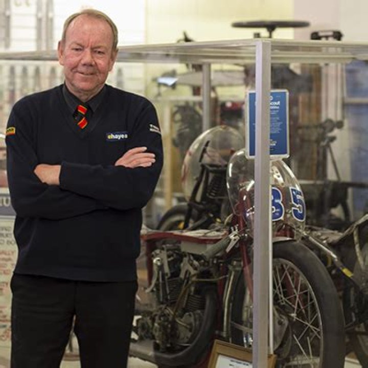 Neville Hayes with Burt Munro's record-breaking motorcycle in his Invercargill hardware store earlier this year. Photo / Mark Mitchell