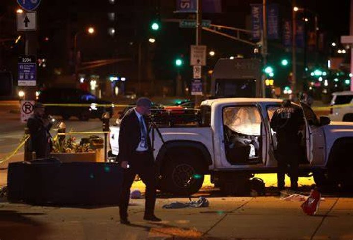 Police work at the scene where a man and a woman were found slain in a ute in Gaylordsville, near New Milford. Photo / AP