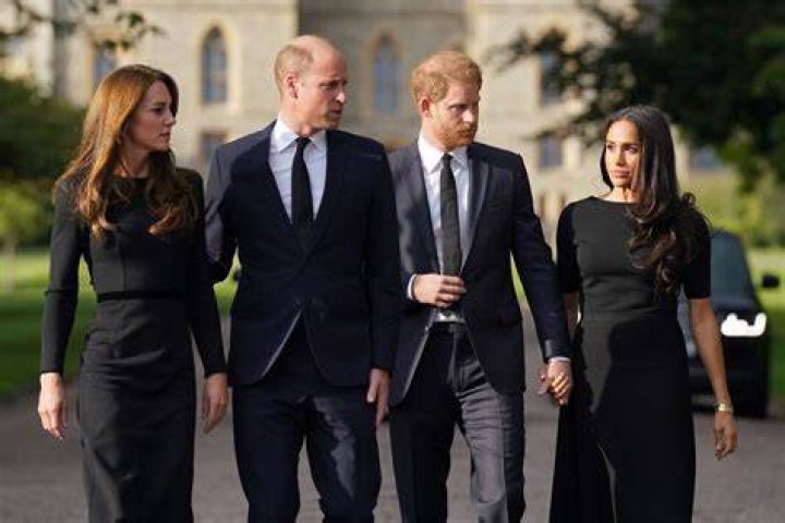 Prince William and Prince Harry walk beside each other. Photo / AP