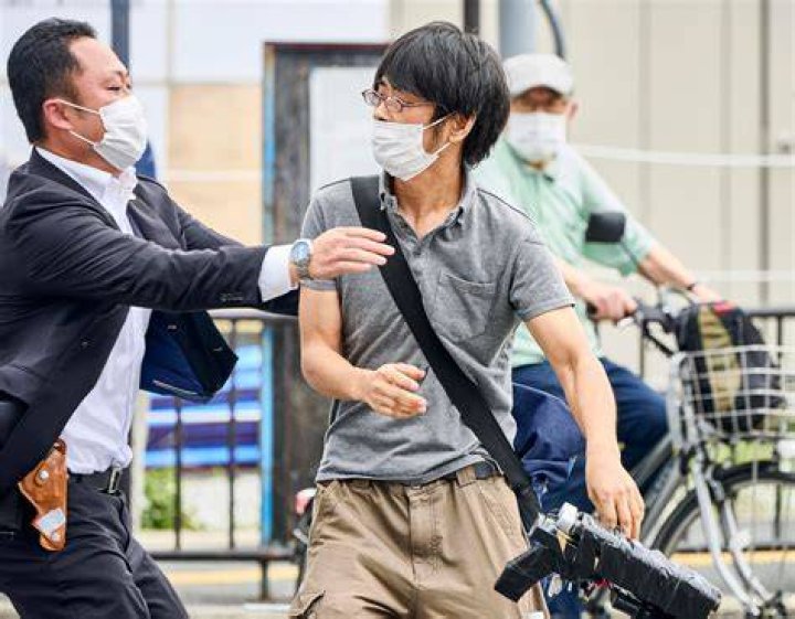 Tetsuya Yamagami is detained after the shooting in Nara, western Japan. Photo / AP