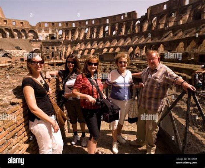  Tourists at Flavian Amphitheater in Naples, Italy