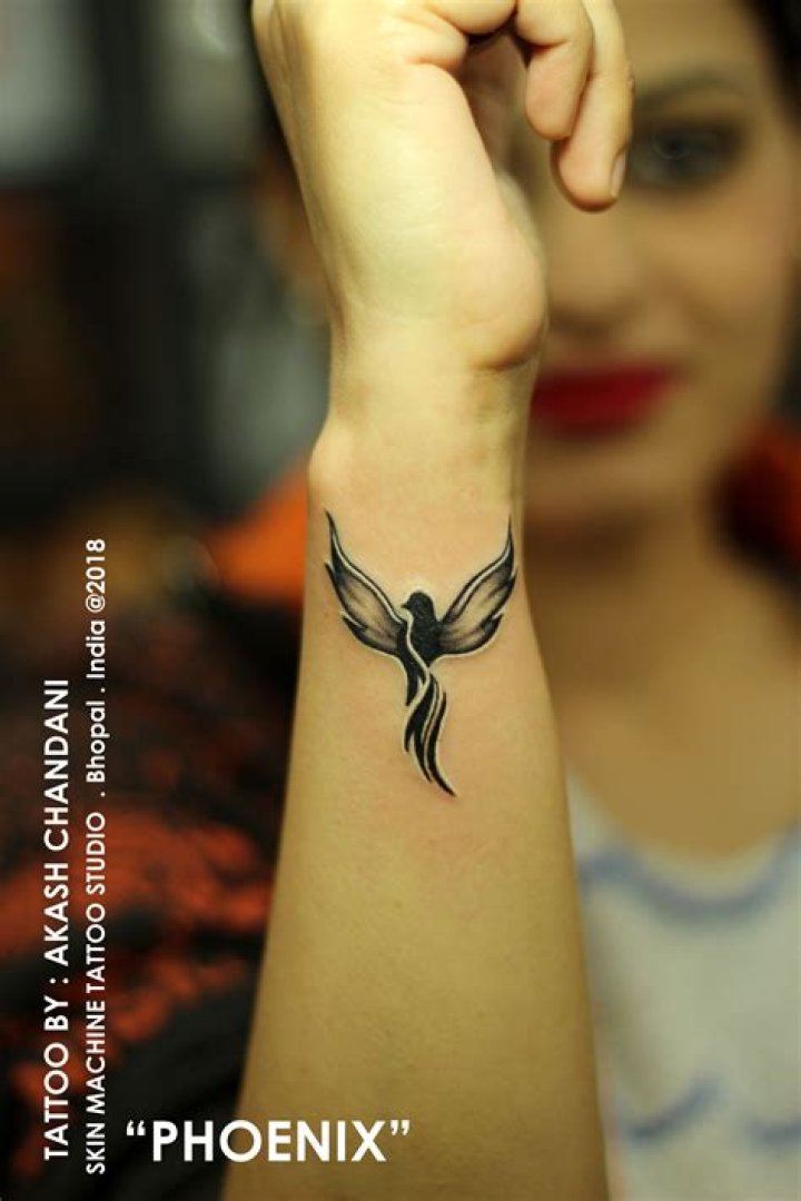 Wrist phoenix tattoos Wrist phoenix tattoos